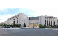 Court house on a busy city street.